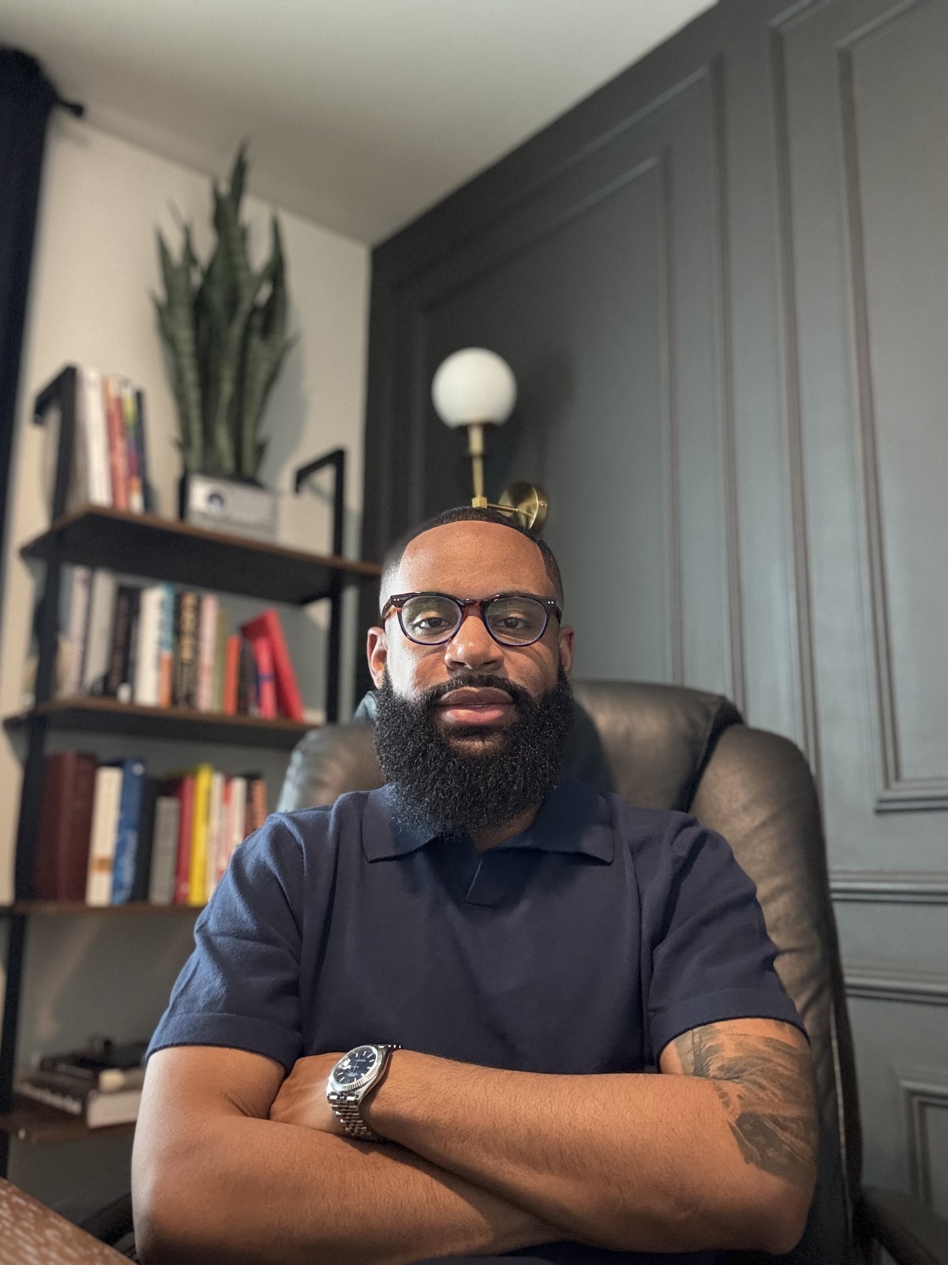 Jamell Culler, founder of Vantide Capital, seated in his office